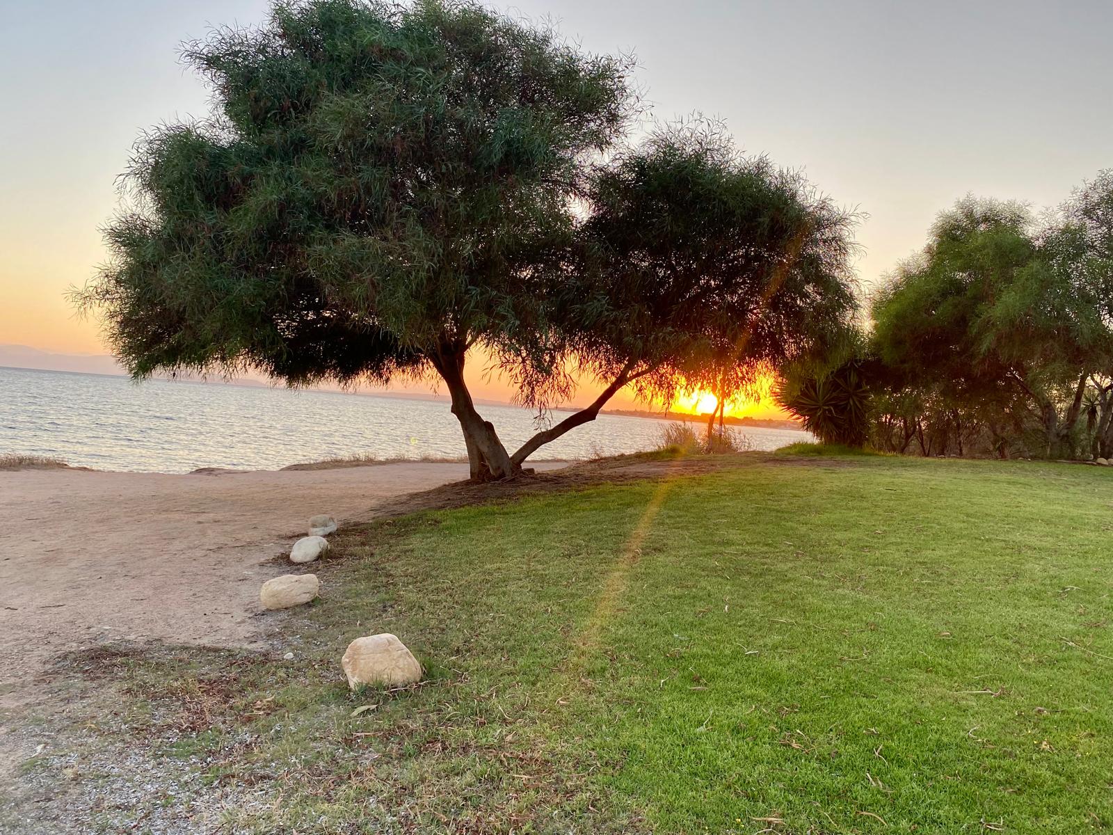 Fotografia del territorio: tramonto sulla costa, non vista dalla casa